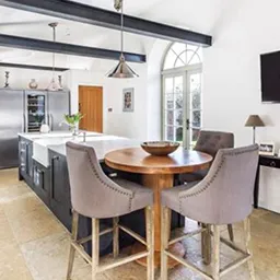 kitchen chairs around a table