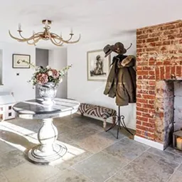 red brick fireplace in room